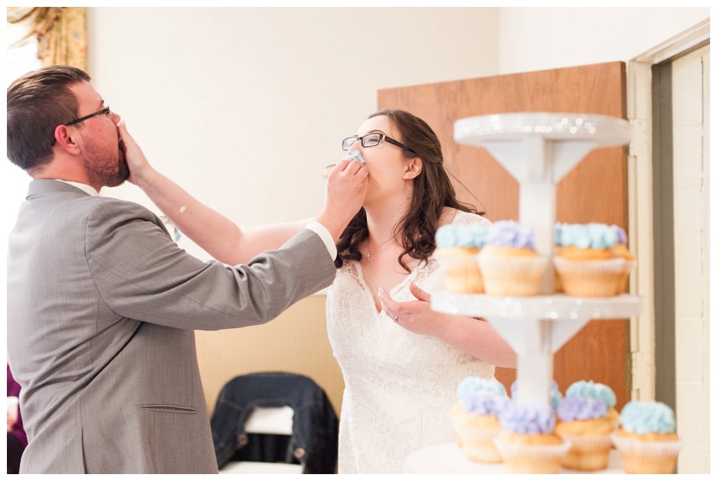 Katie & Randall Wedding smashing cake in face