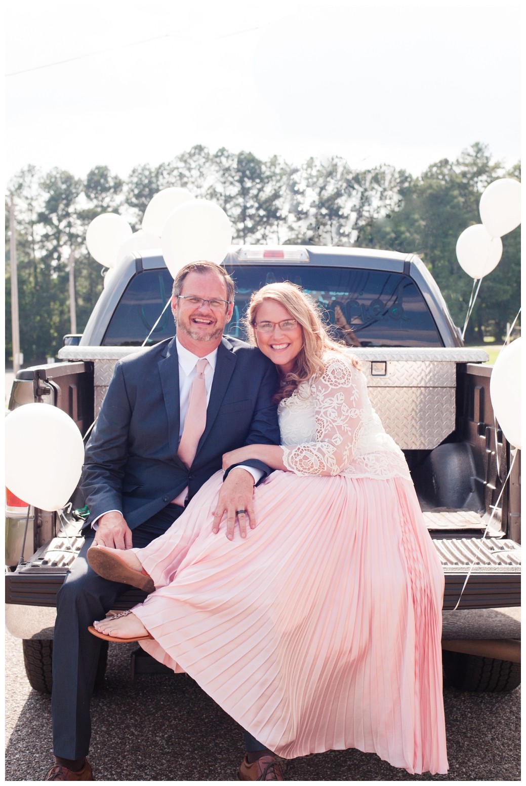 Lambuth Campus Wedding bride and groom on truck bed