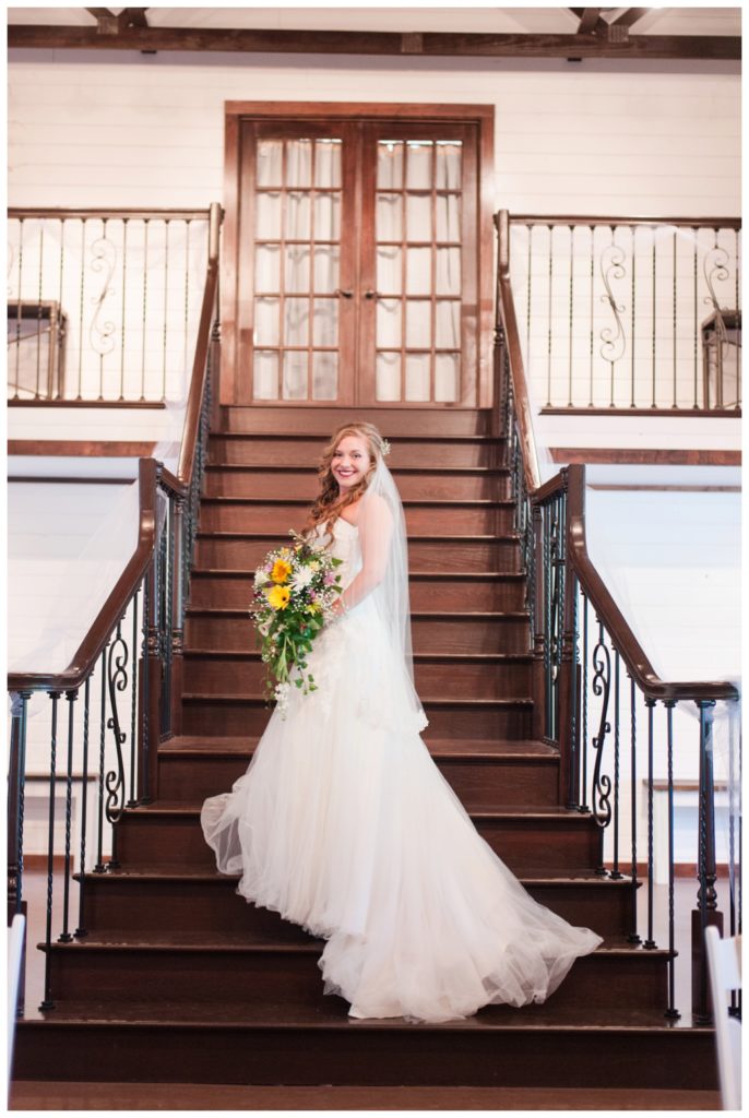 Horseshoe Lake Venue Huron TN bride on staircase