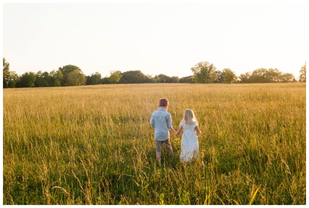 Wildflowers pictures boy and girl walking away 