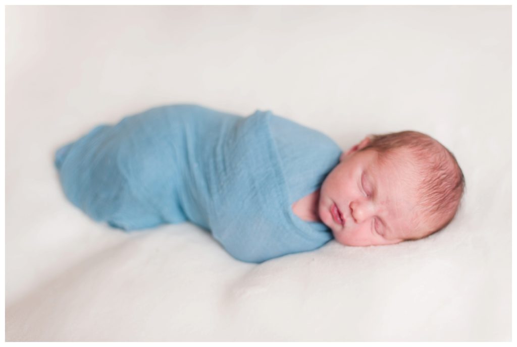 Spencer Newborn baby in blue wrap