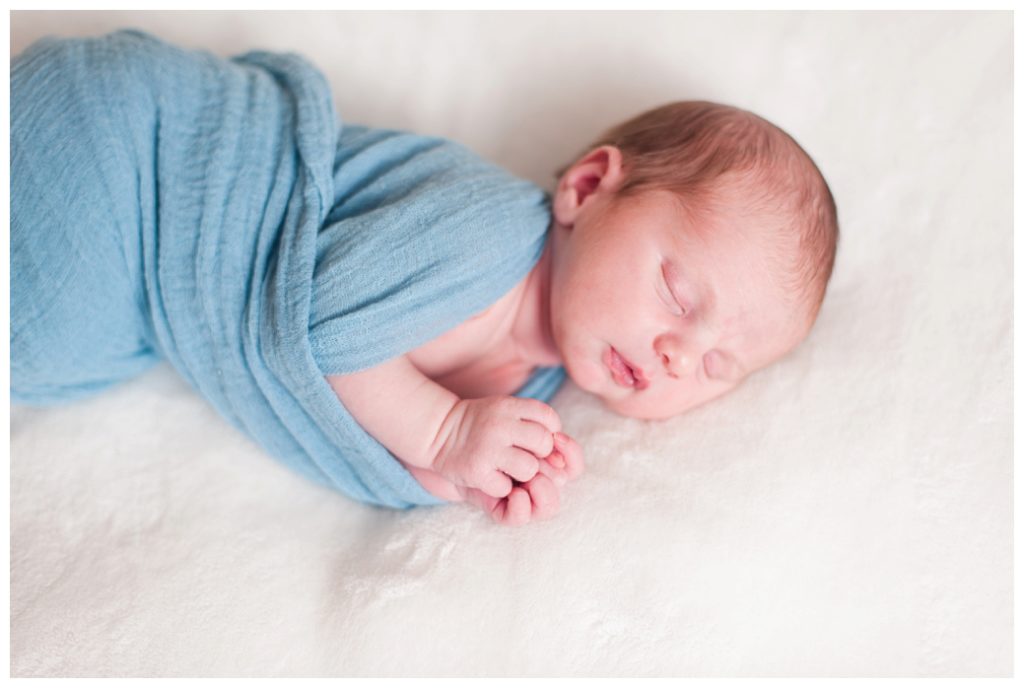 Spencer Newborn newborn on white blanket