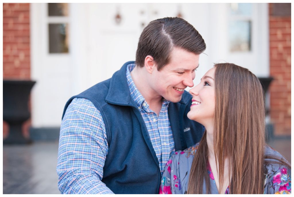 Engagement Session Bolivar TN sitting on step looking at each other