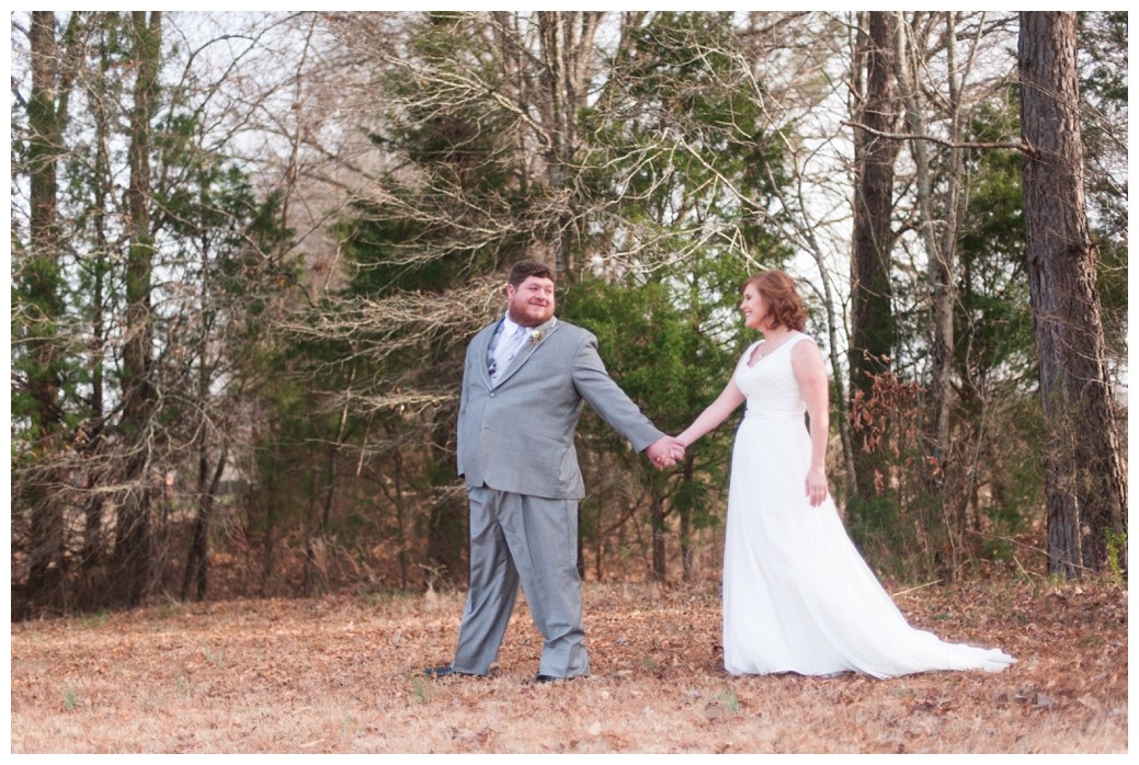 groom leading bride by the hand