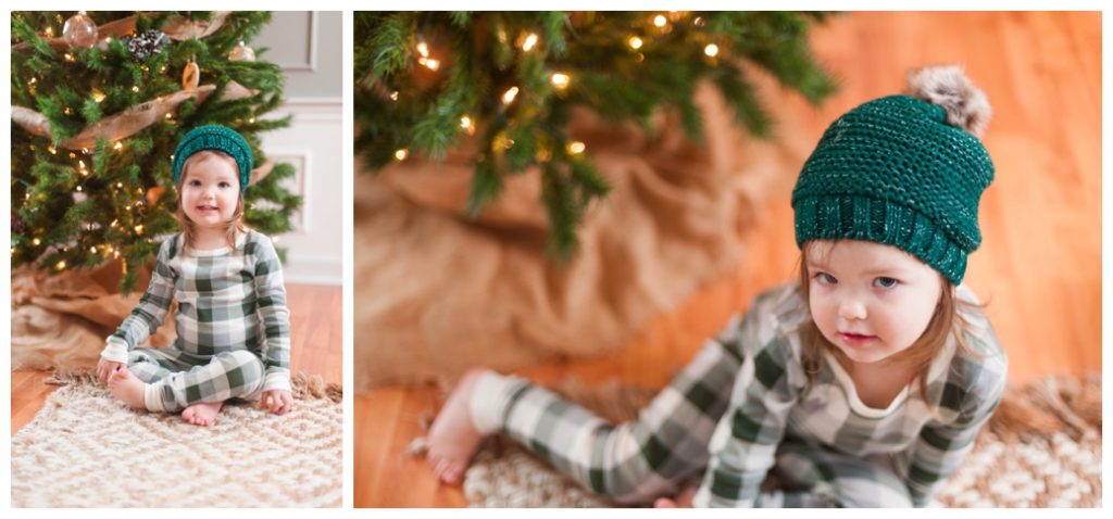 six month session little girl by christmas tree