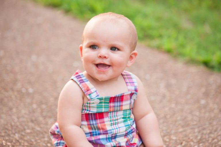 University of Memphis Lambuth little boy smiling on sidewalk