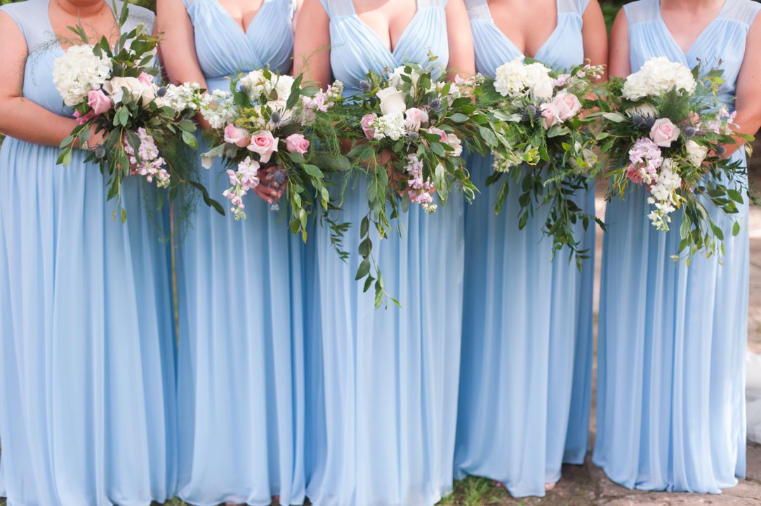 The Columns in Bolivar & Falcon Ridge Farm Wedding blue dresses and flowers