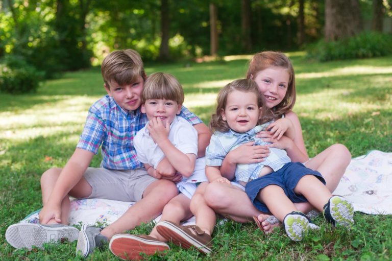 grandchidren's portraits cousins hugging