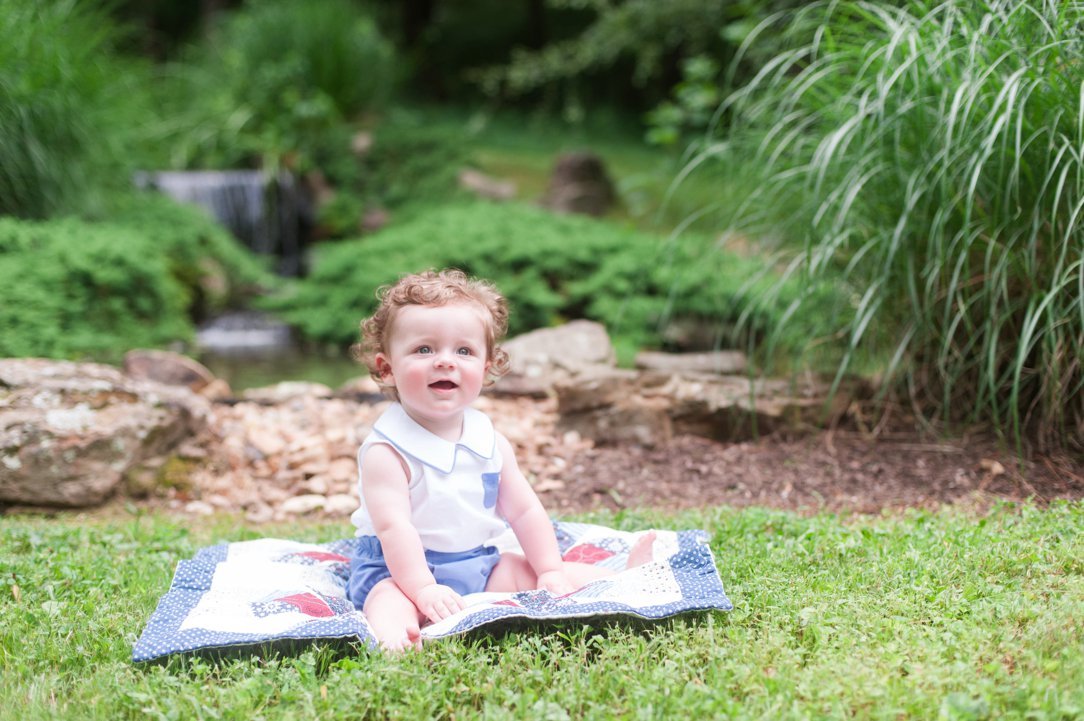 six-month-old portrait little boy on blanket