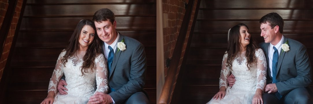 The colonial tea room bride and groom laughing on staircase