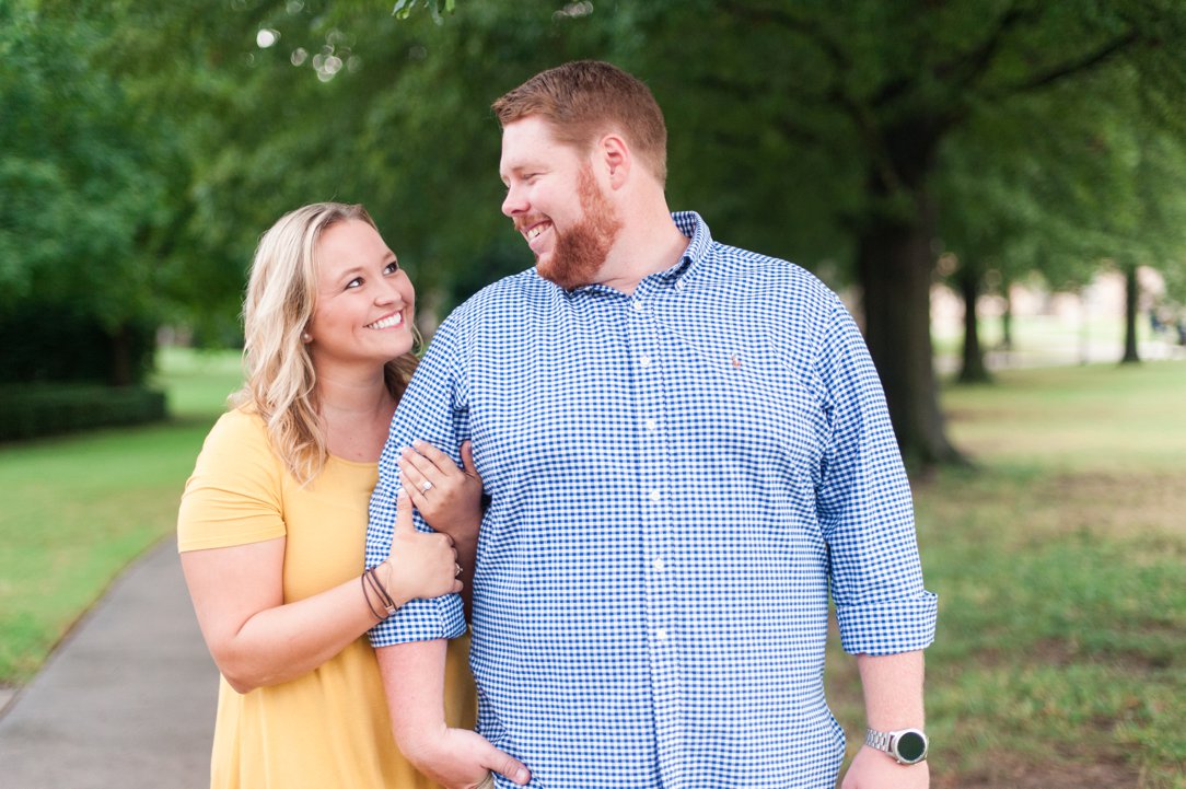 Rhodes College Engagement couple looking at each other