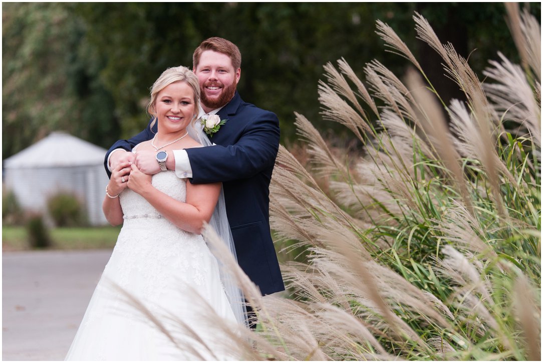 The Venue at Waddell Place couple in tall grass