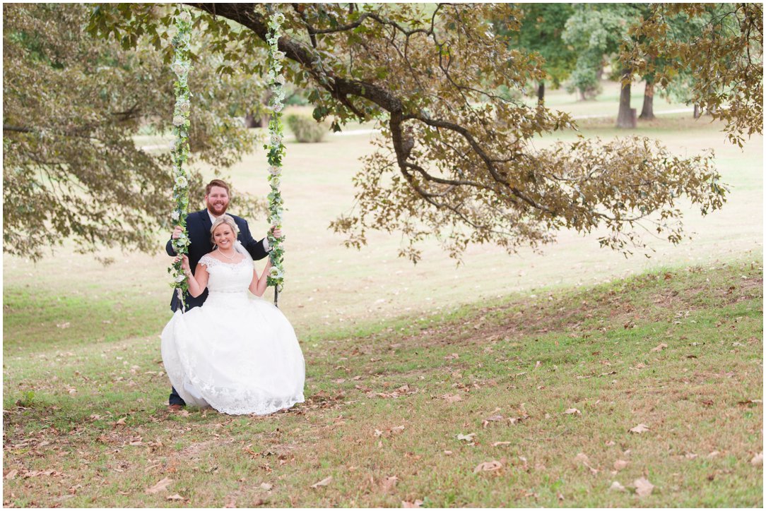 The Venue at Waddell Place bride and groom in swing