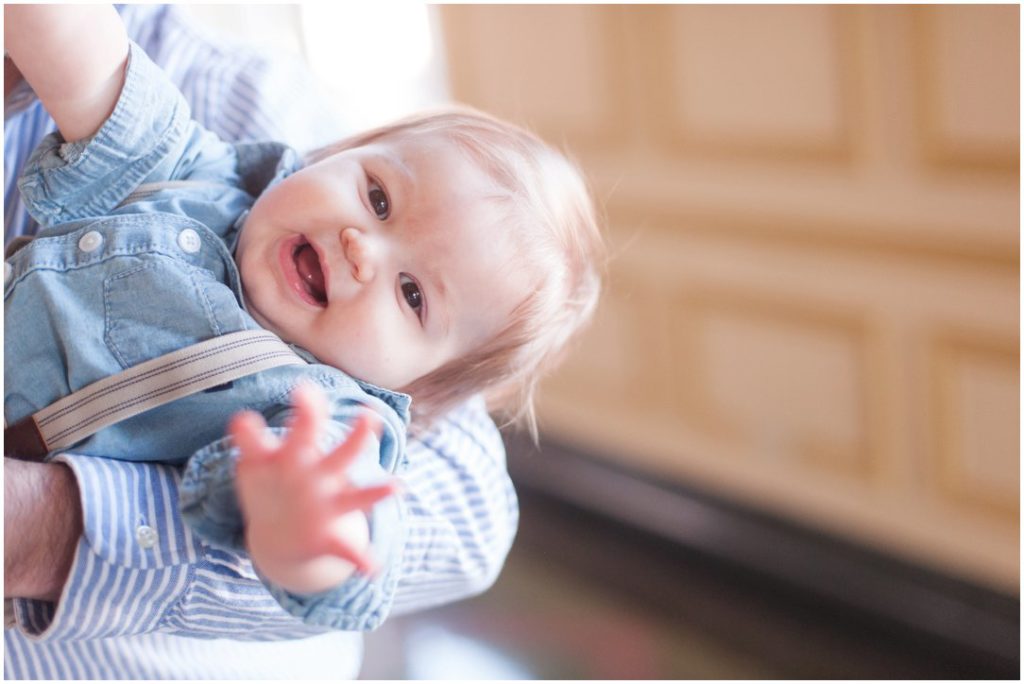 The New Southern portrait session little boy smiling reaching for camera