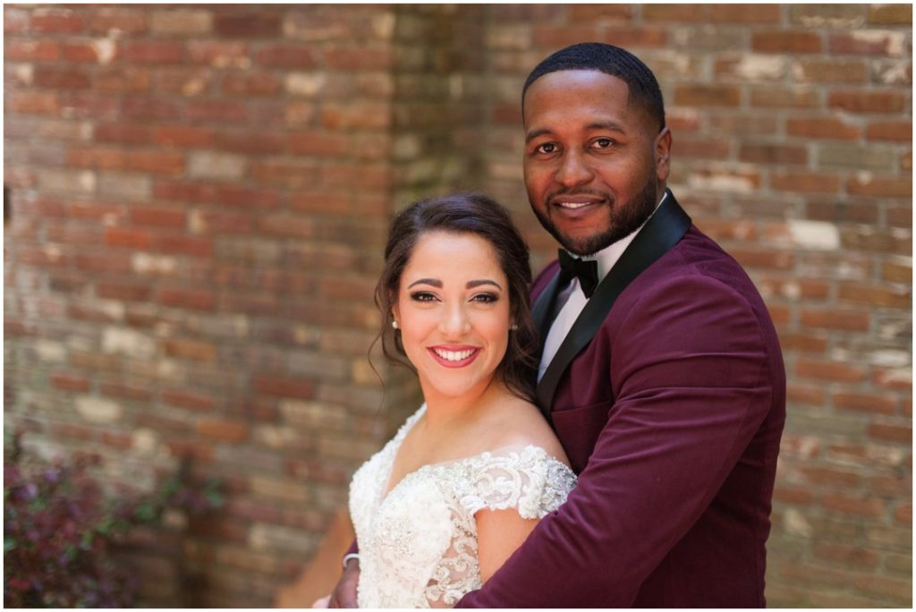 Outdoor Spring Wedding groom holding bride