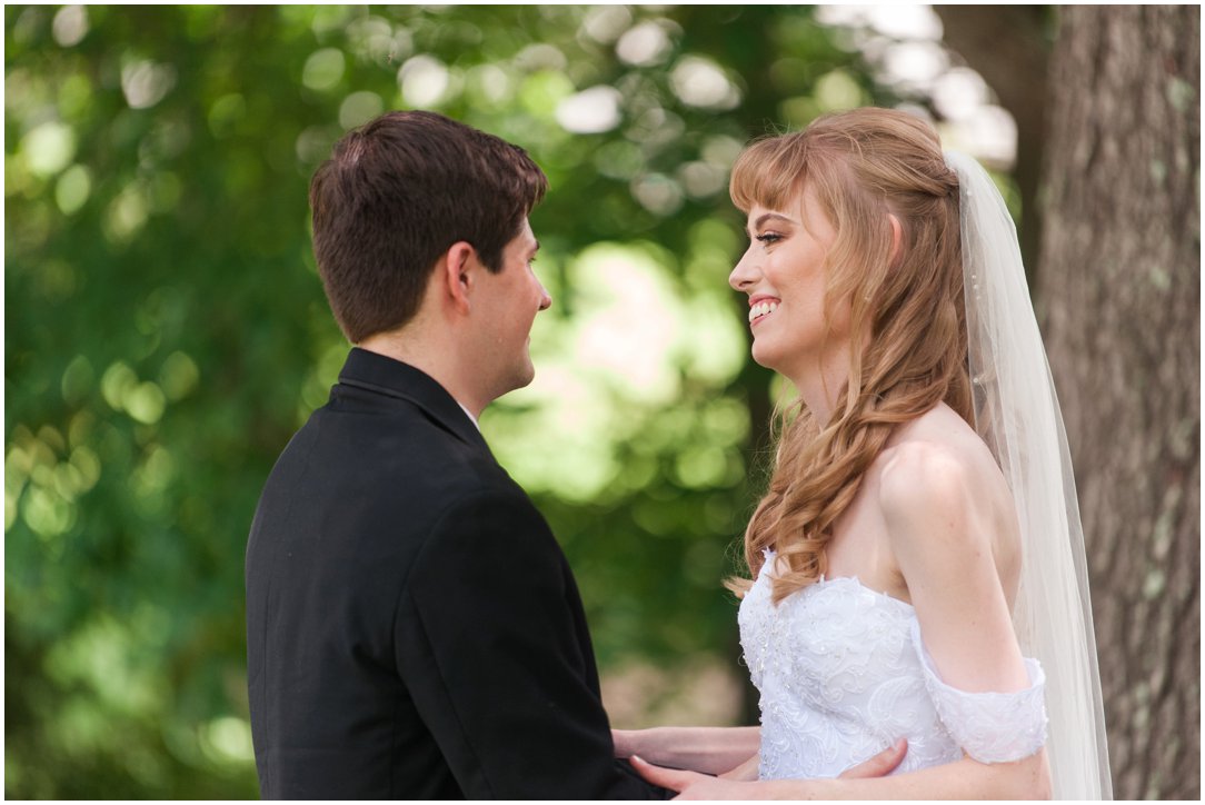 Summer lakeside Wedding first look bride and groom