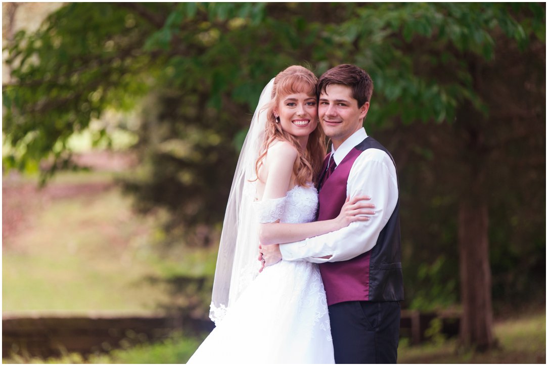 Summer lakeside Wedding bride and groom portrait