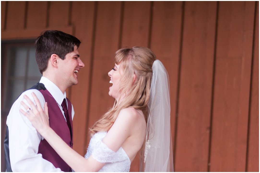 Summer lakeside Wedding couple laughing