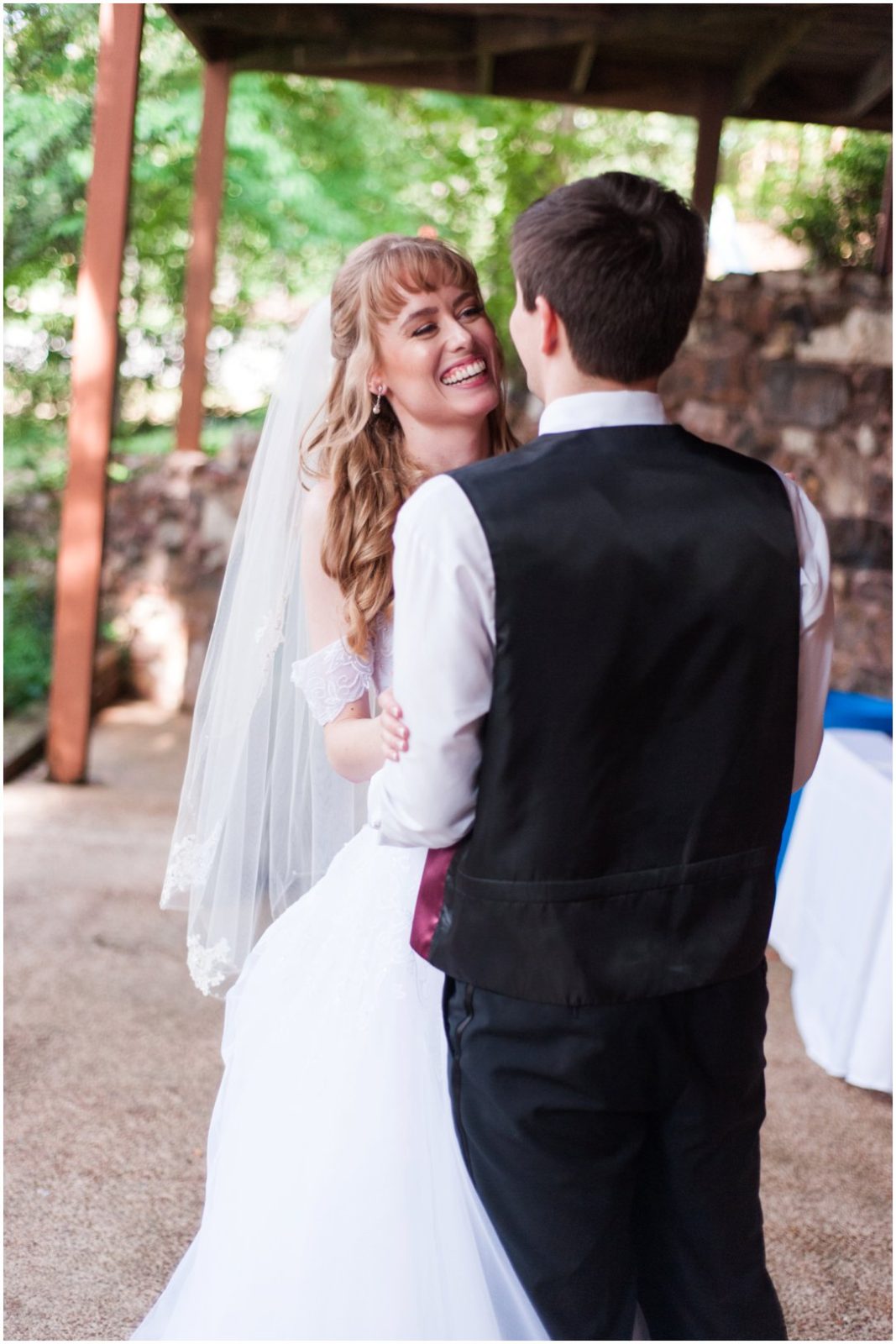 Summer lakeside Wedding couple dancing