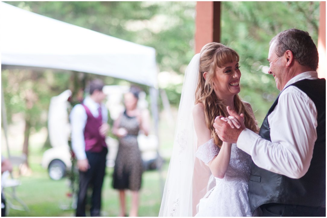 Summer lakeside Wedding father and daughter dance