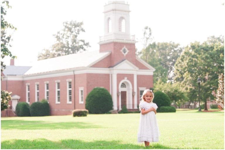 kid portrait outside in front of chapel