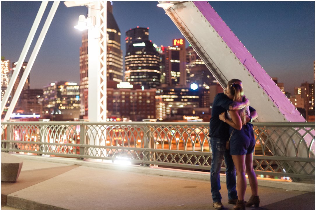 Nashville Pedestrian Bridge Proposal couple hugging