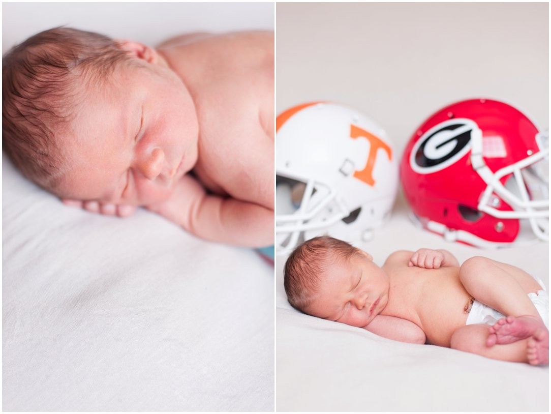 Newborn with football helmets