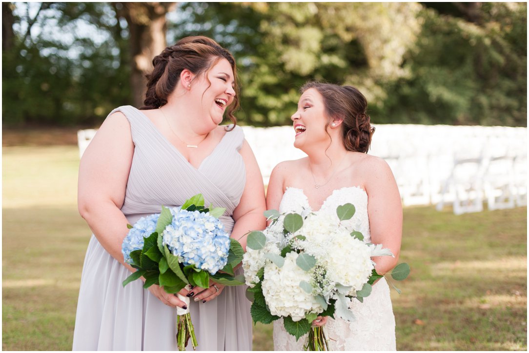 bride and sister laughing