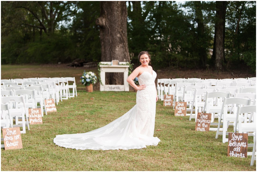 bride in aisle fall farm wedding