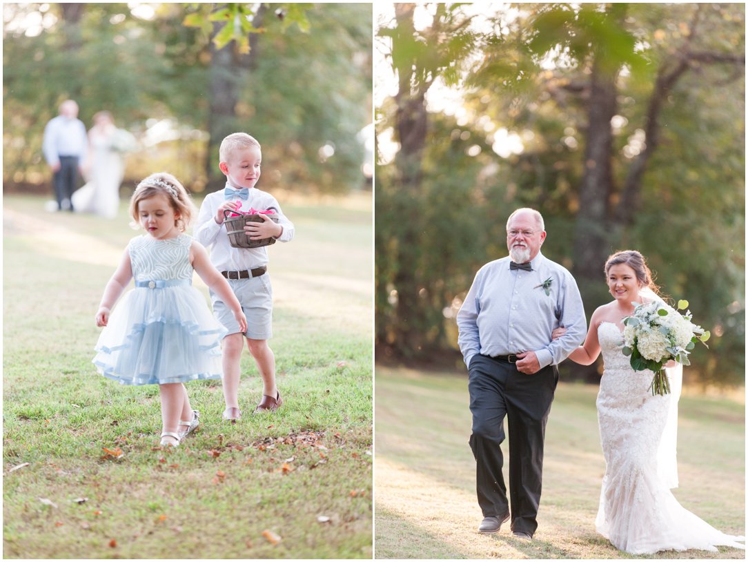 flower girl and bride walking down aisle with dad