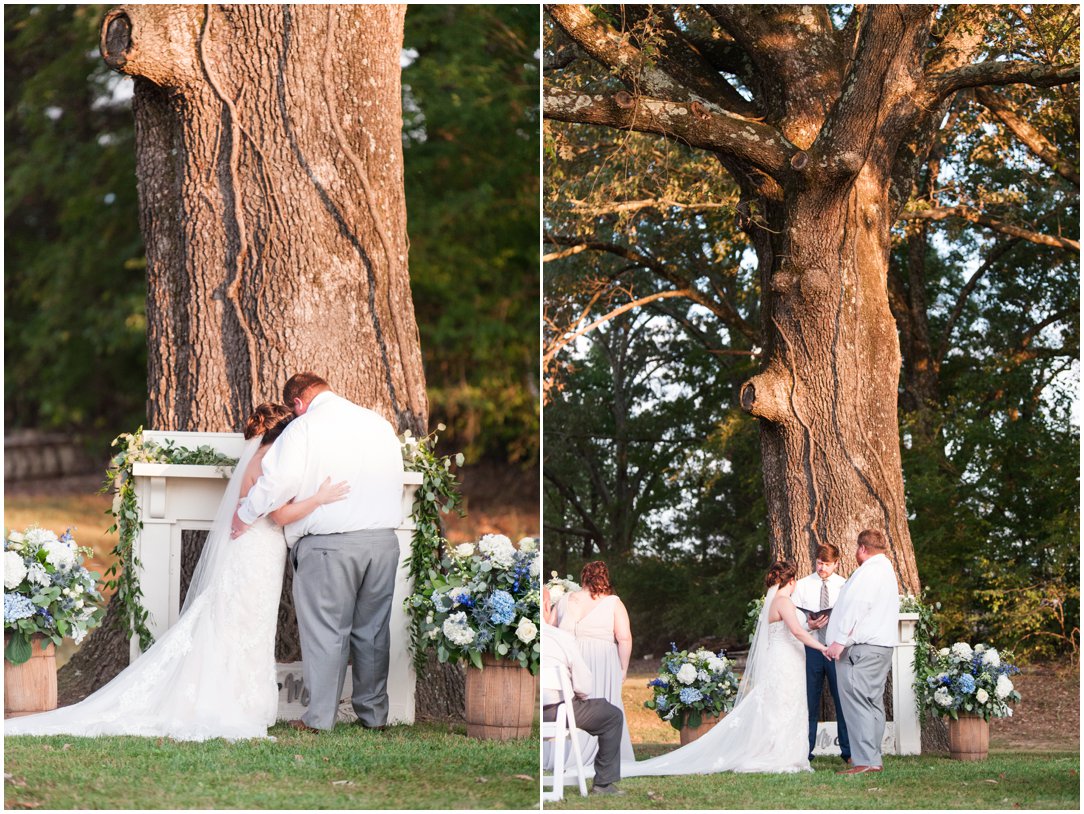 bride and groom hugging after sand ceremony