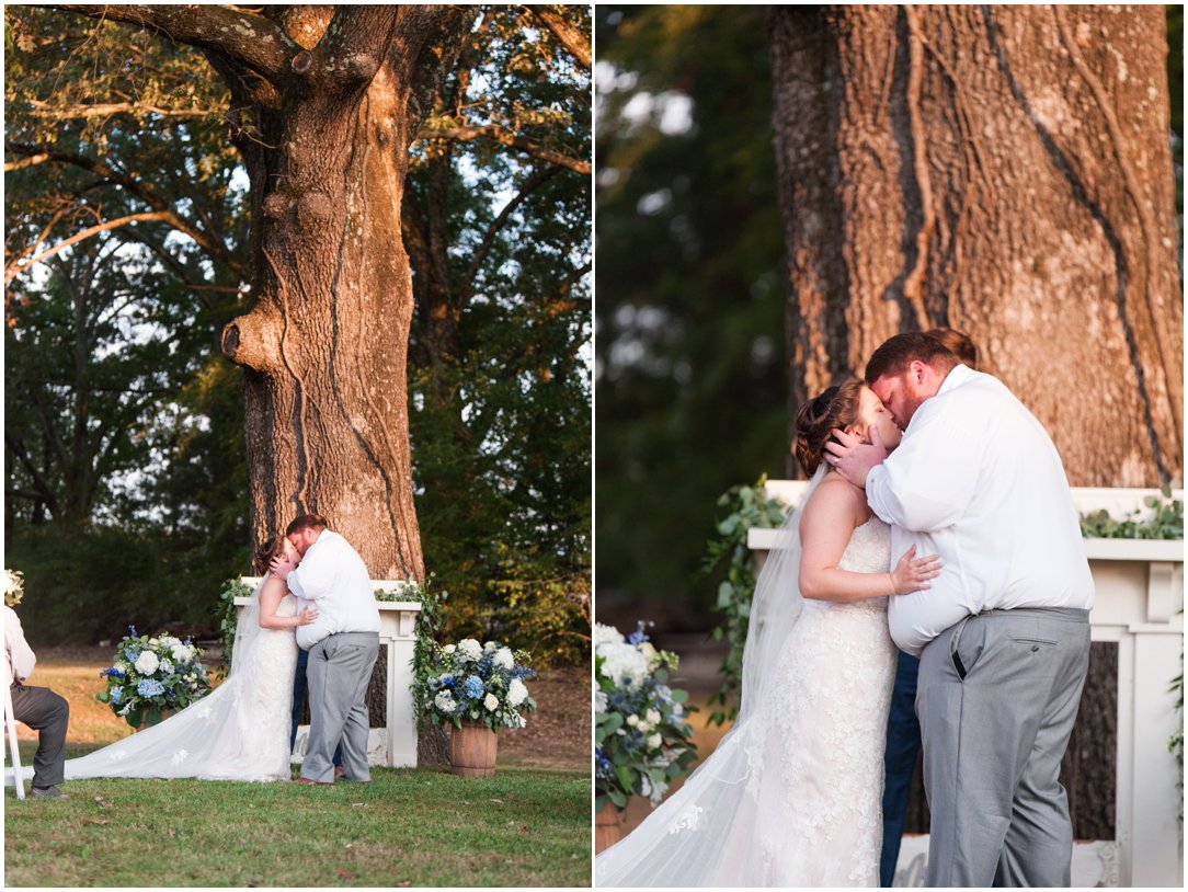 groom kissing bride at end of ceremony