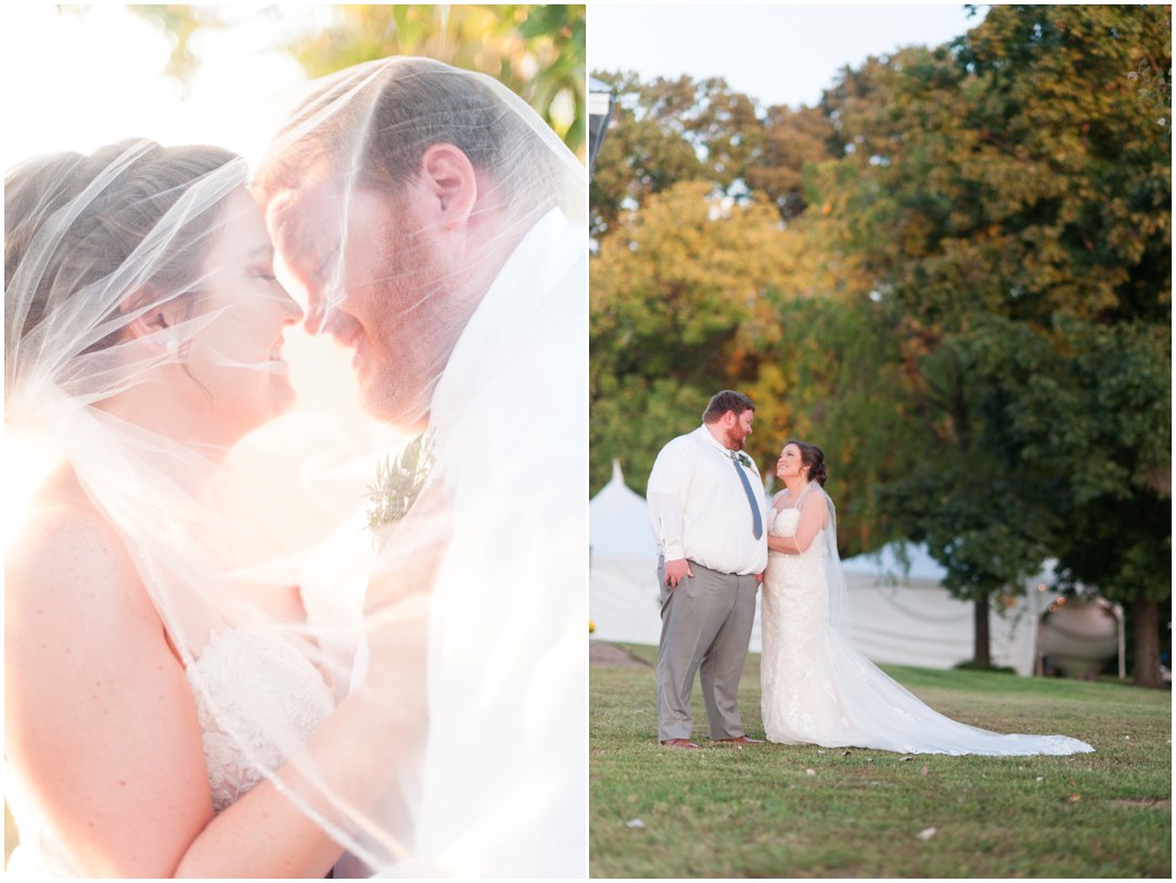 bride and groom under veil and standing in front of tent