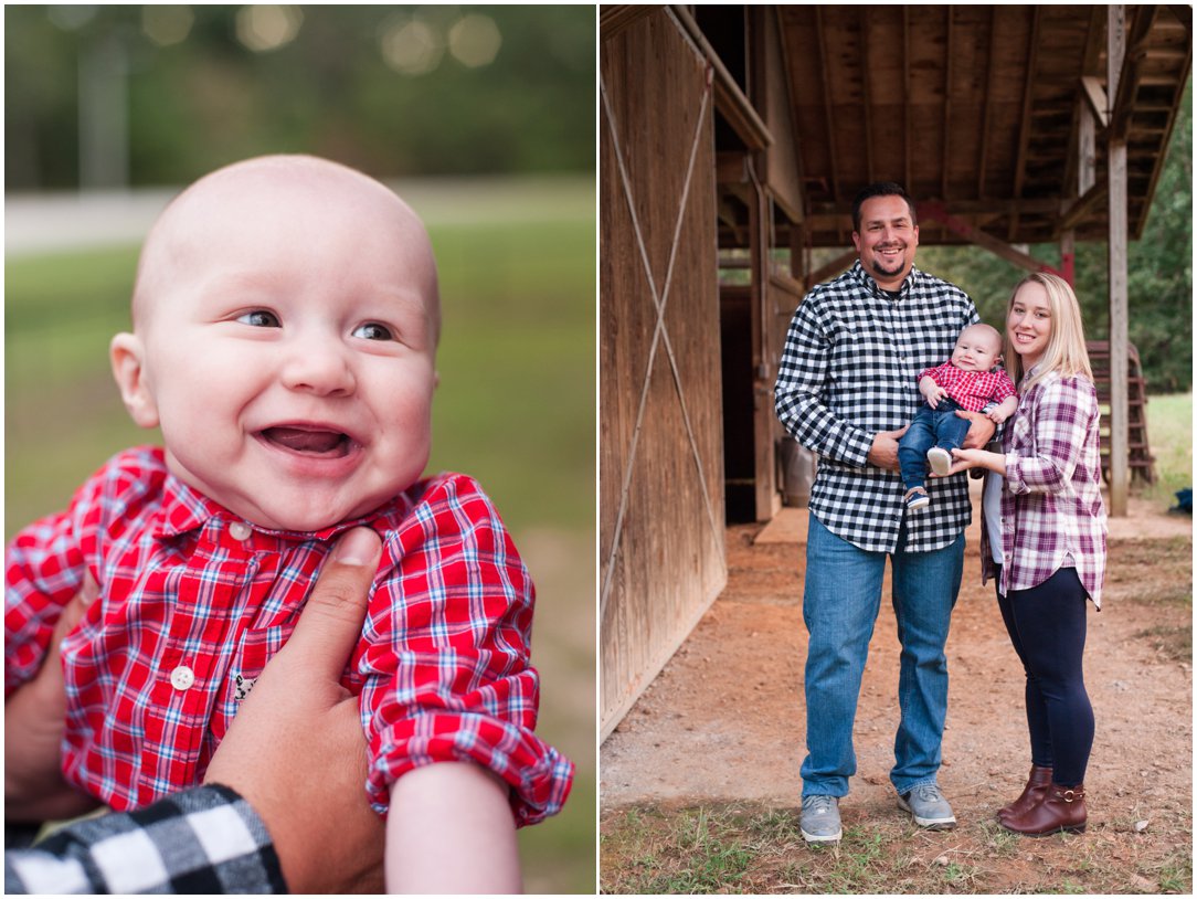 baby and parents in barn