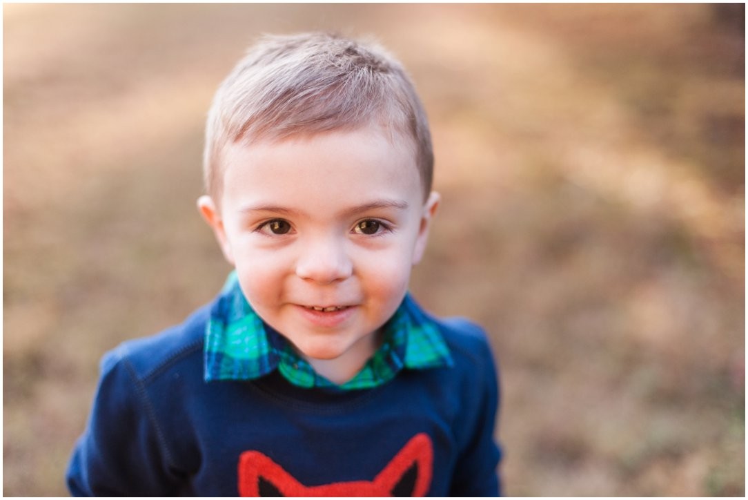 little boy in blue sweater