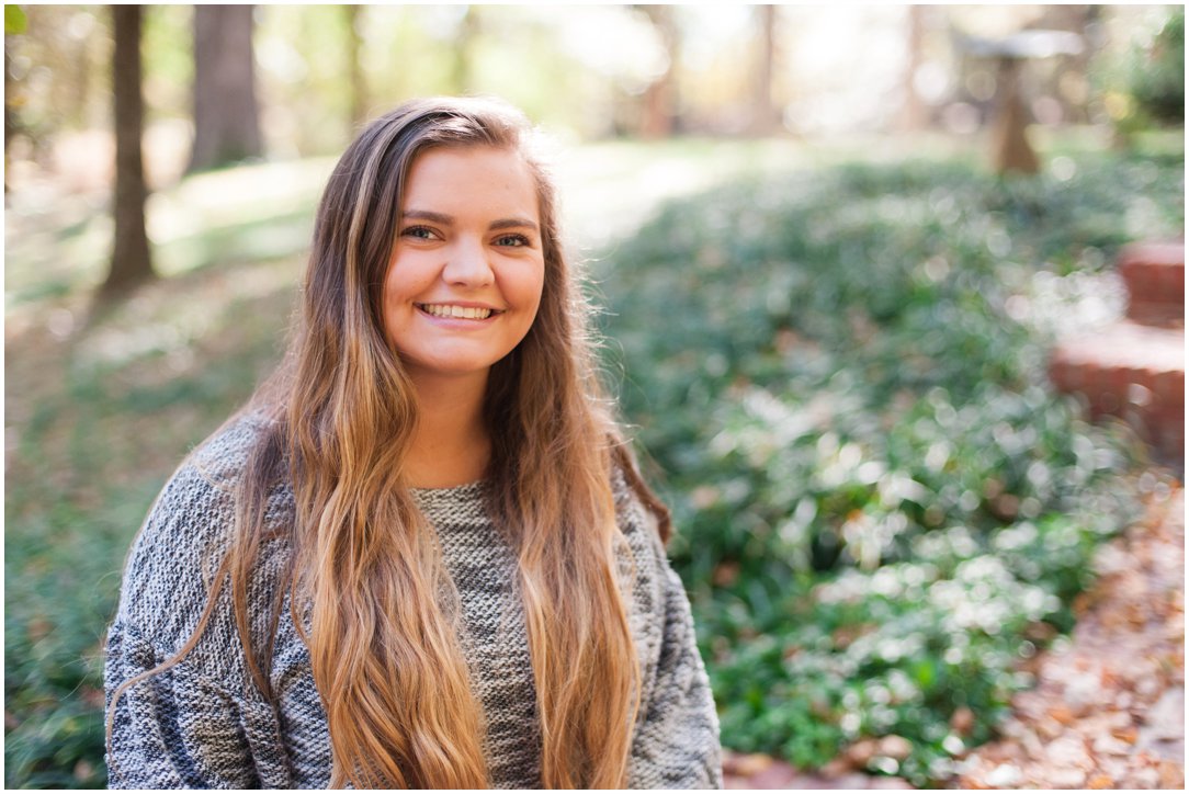 teenage girl in grey shirt