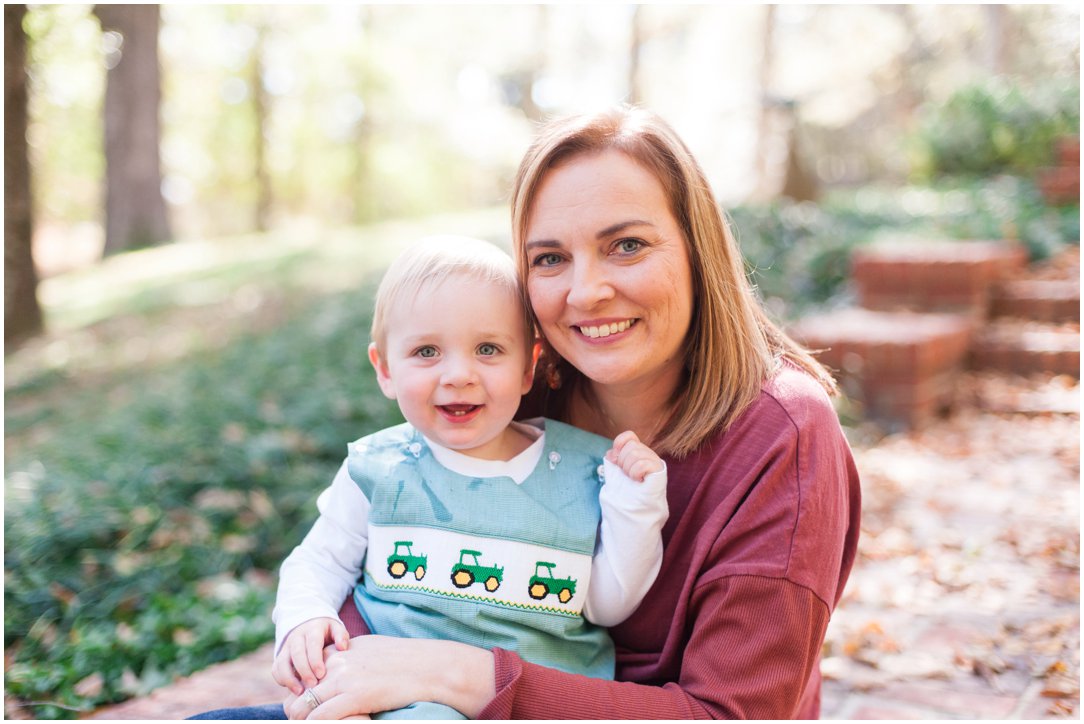 mom with little boy in tractor overalls