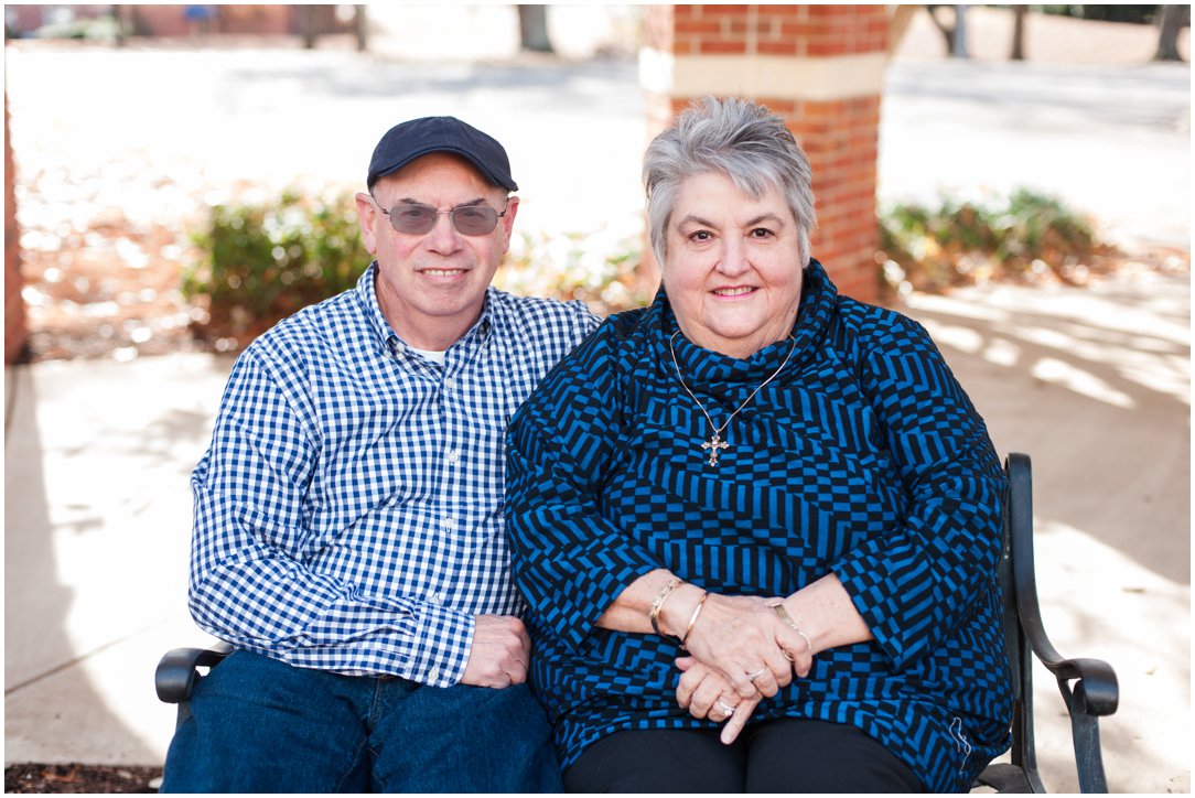 couple in blue on bench