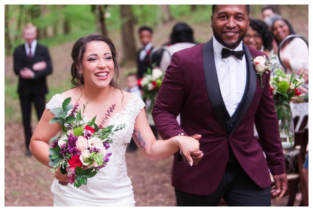 couple leaving wedding outside