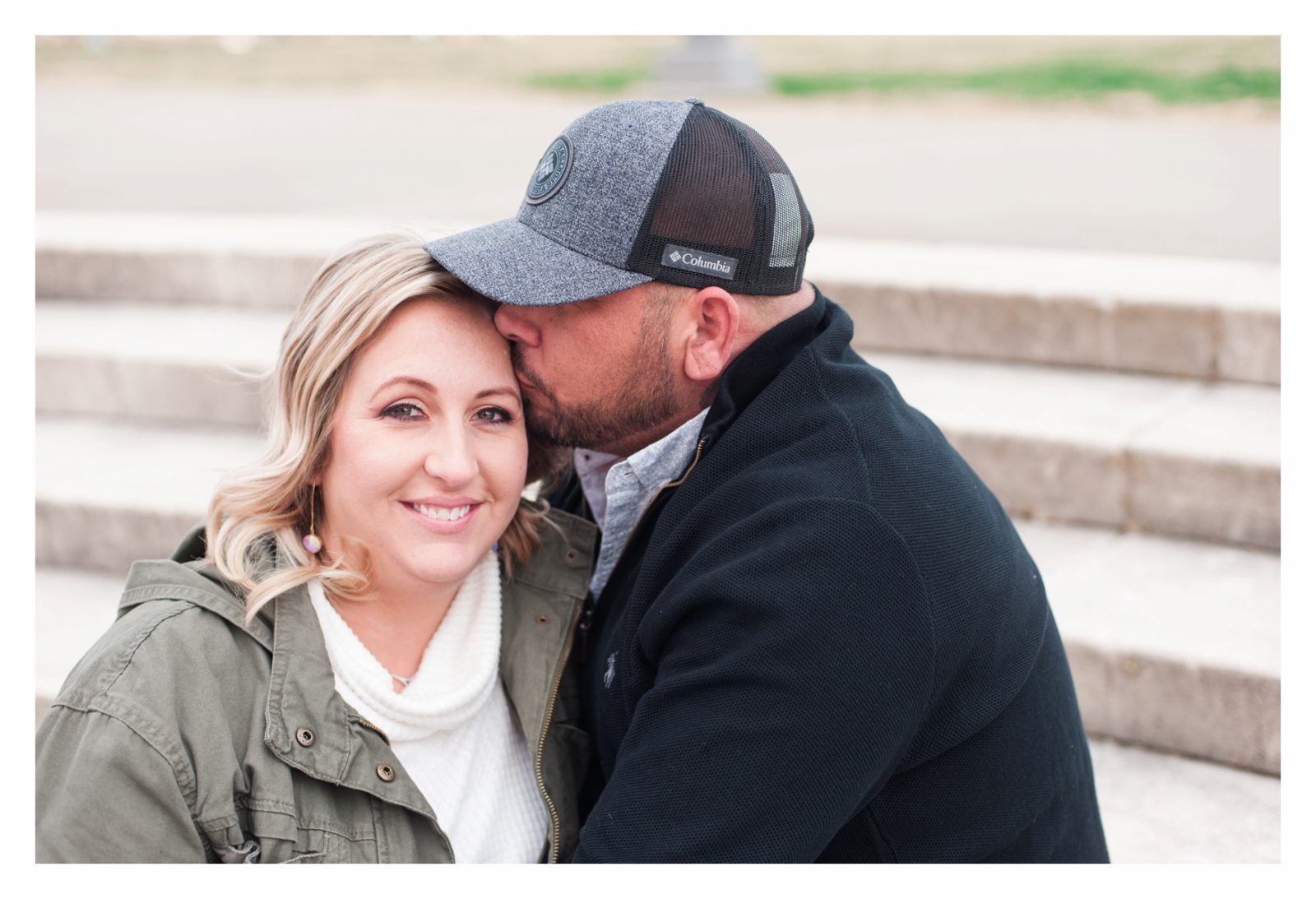 guy kissing girl on the head in Nashville TN