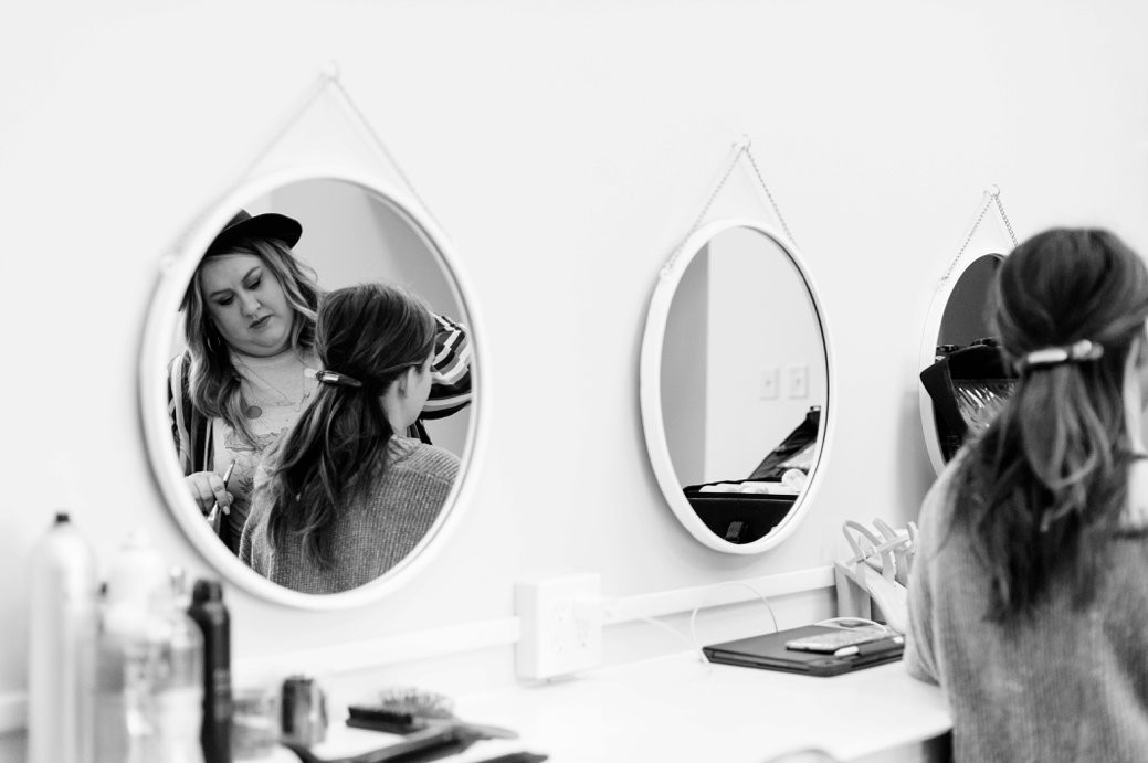 bride getting hair done