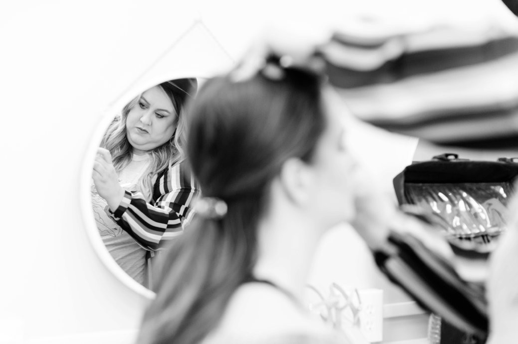 bride getting makeup done