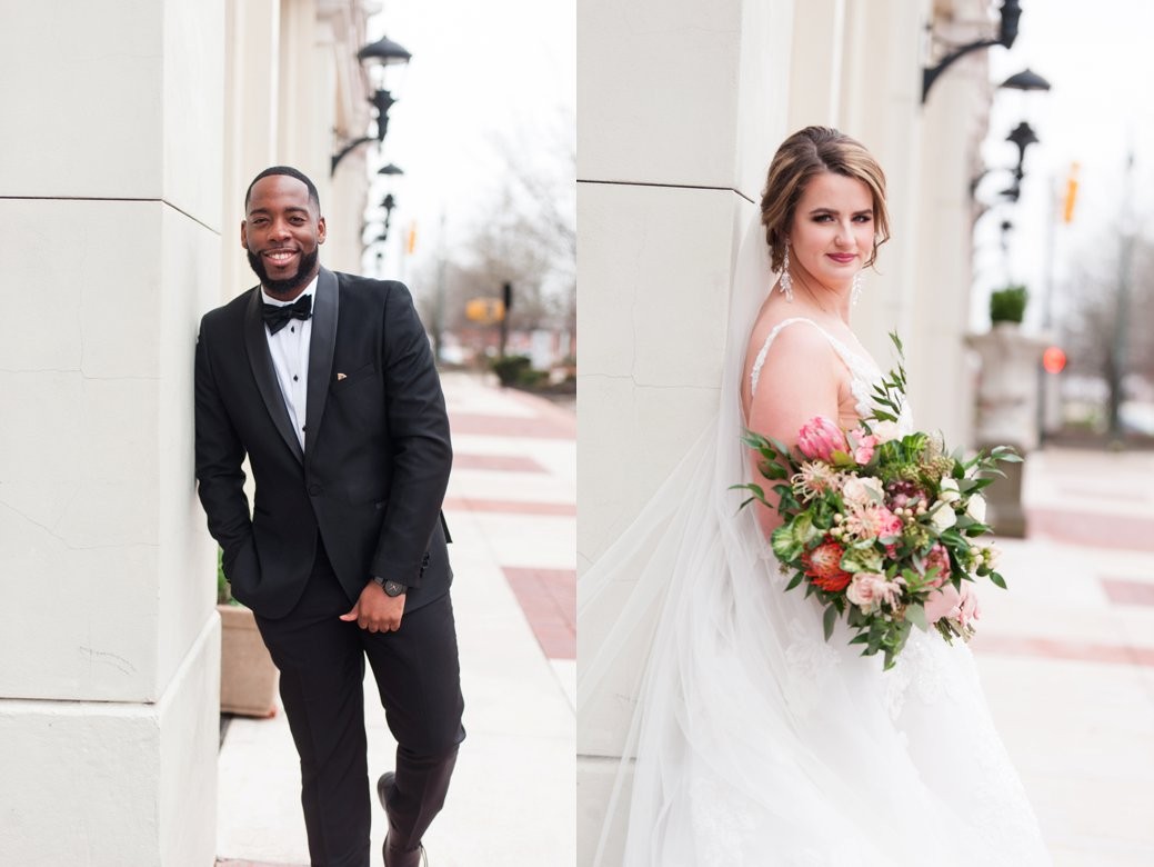 bride and groom by building