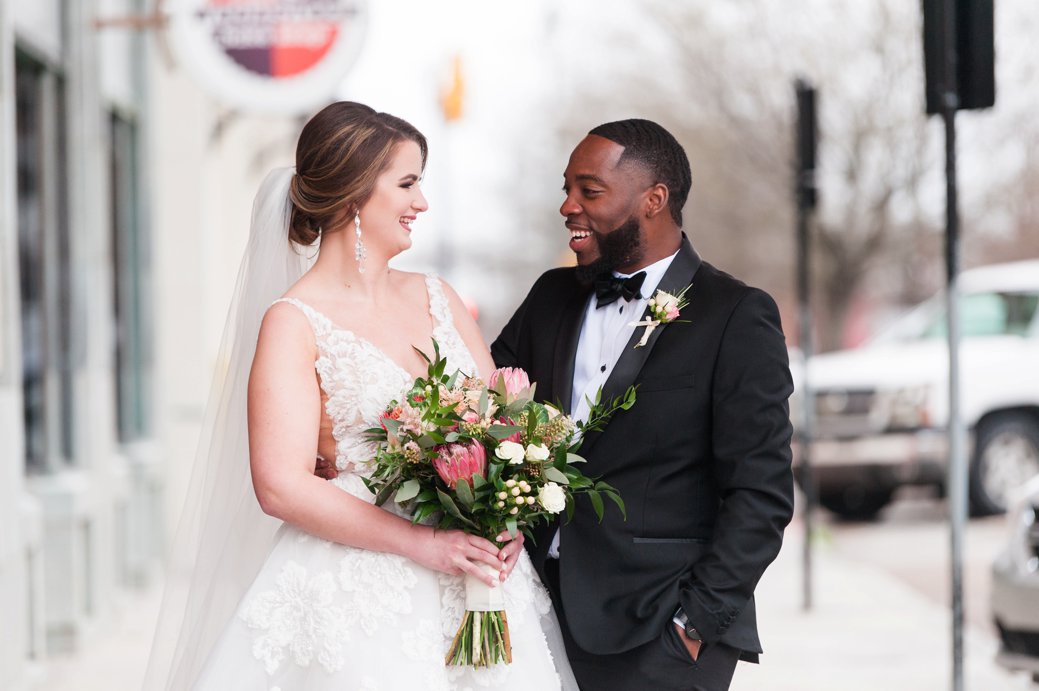 bride and groom looking at each other