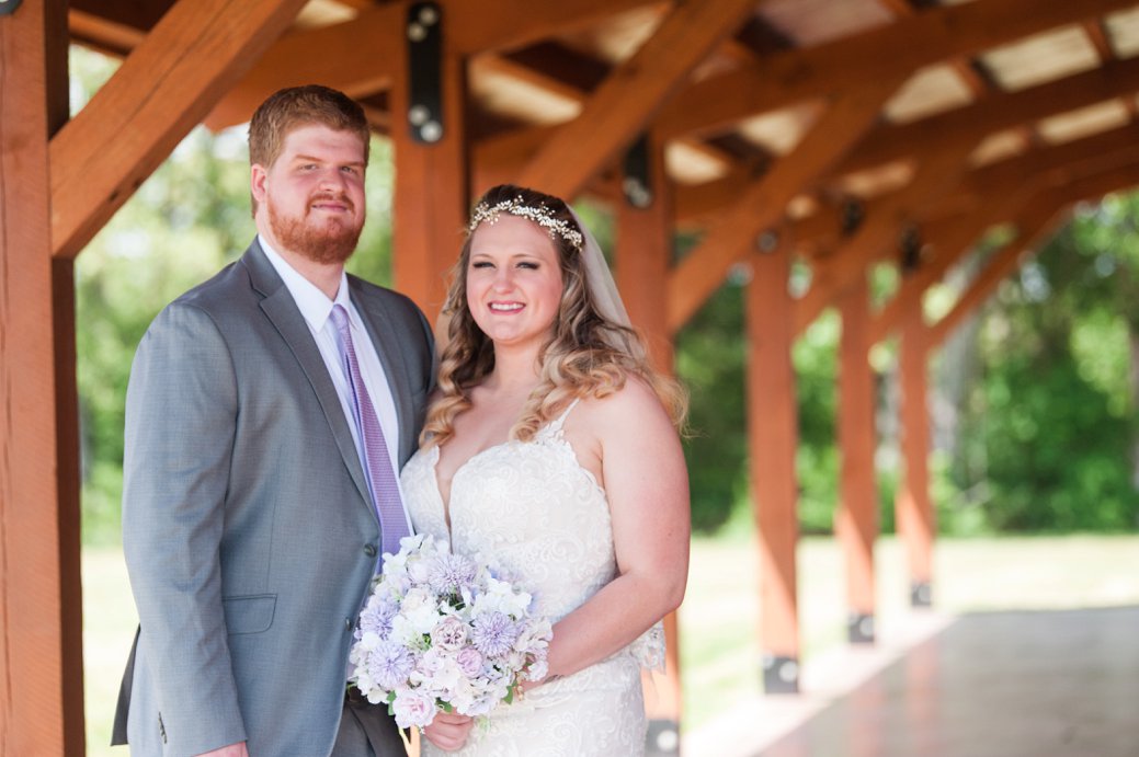 bride and groom at blessings barn