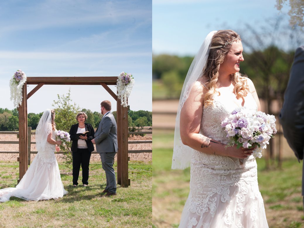 bride and groom under arbor