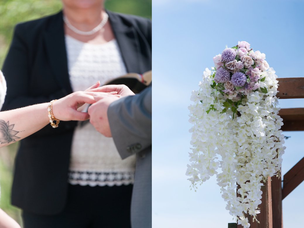 flowers on arbor and groom putting on ring