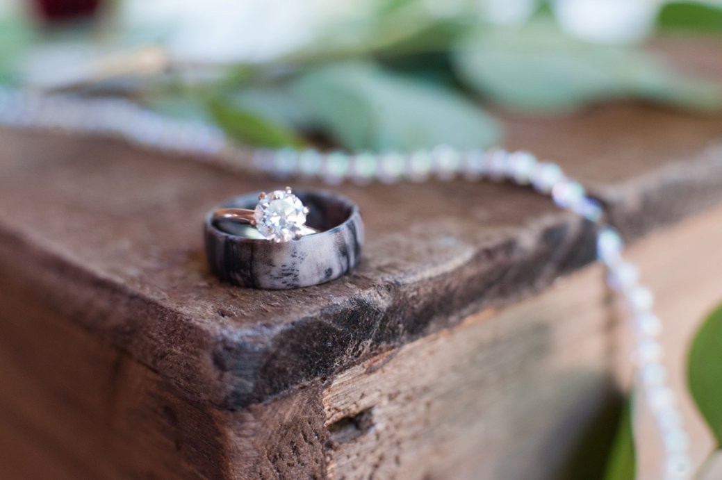 wedding rings on wood