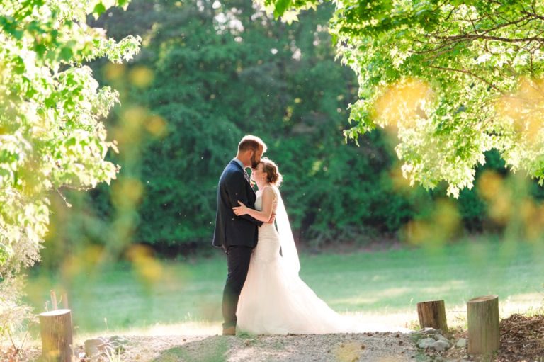 K & M Barn couple in trees