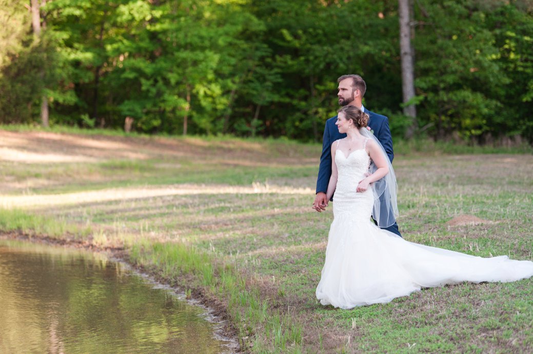 K & M Barn couple by pond